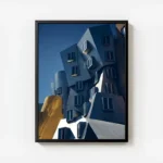 poster batiment moderne acier et or avec cadre.webp