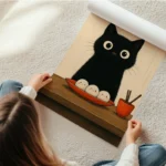 poster chat noir avec boulettes en rouleau.webp
