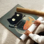 poster chat noir et poisson orange enroule.webp