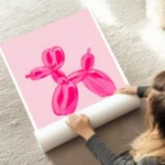 poster chien ballon rose au sol.webp