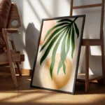 poster feuilles vertes et formes geometriques encadre.webp