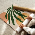poster feuilles vertes et formes geometriques enroule.webp