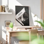 poster tasse blanche sur livre bureau.webp