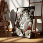 poster tete de leopard noir et blanc yeux bleus encadre.webp