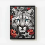 poster tete de puma noir et blanc aux yeux bleus avec cadre.webp