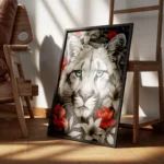 poster tete de puma noir et blanc aux yeux bleus encadre.webp