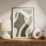 affiche abstraite aux formes vertes et beiges avec des lignes blanches et une te meuble.webp