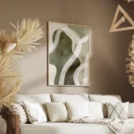 affiche abstraite aux formes vertes et beiges avec des lignes blanches et une te salon.webp