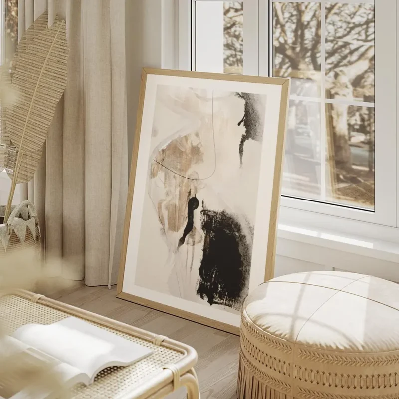 affiche abstraite avec des formes noires et beiges sur fond clair avec des trait salon beige.webp
