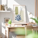 affiche abstraite avec des formes organiques vertes beiges et bleues et des lign bureau.webp