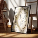 affiche abstraite avec des lignes courbes et des formes de feuilles en noir et j encadre.webp