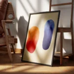 affiche abstraite avec deux formes organiques brossees une orange et rouge lautr encadre.webp