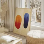 affiche abstraite avec deux formes organiques brossees une orange et rouge lautr salon beige.webp