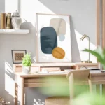 affiche abstraite avec formes bleues beiges et oranges sur fond blanc bureau.webp