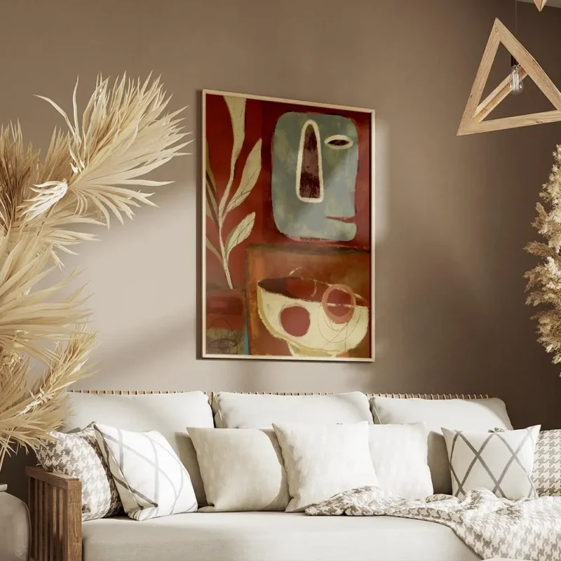 affiche abstraite avec un visage bleu et des formes vegetales sur fond rouge un salon.webp