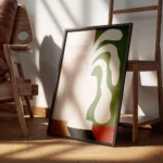 affiche abstraite avec une plante aux formes fluides dans un vase aux couleurs r encadre.webp