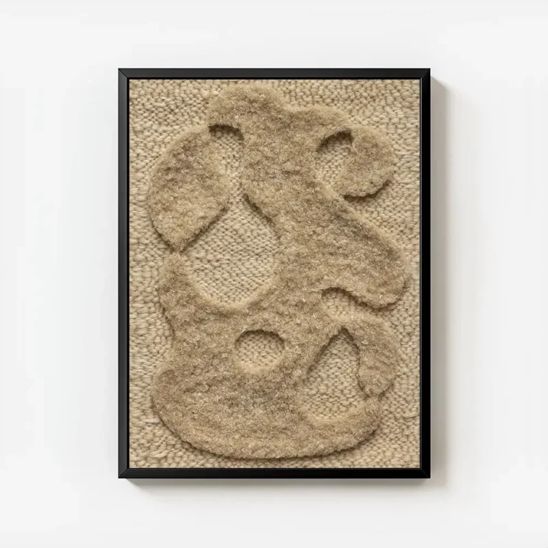 affiche abstraite beige avec des formes organiques texturees sur un fond tricote avec cadre.webp