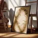 affiche abstraite beige avec des formes organiques texturees sur un fond tricote encadre.webp
