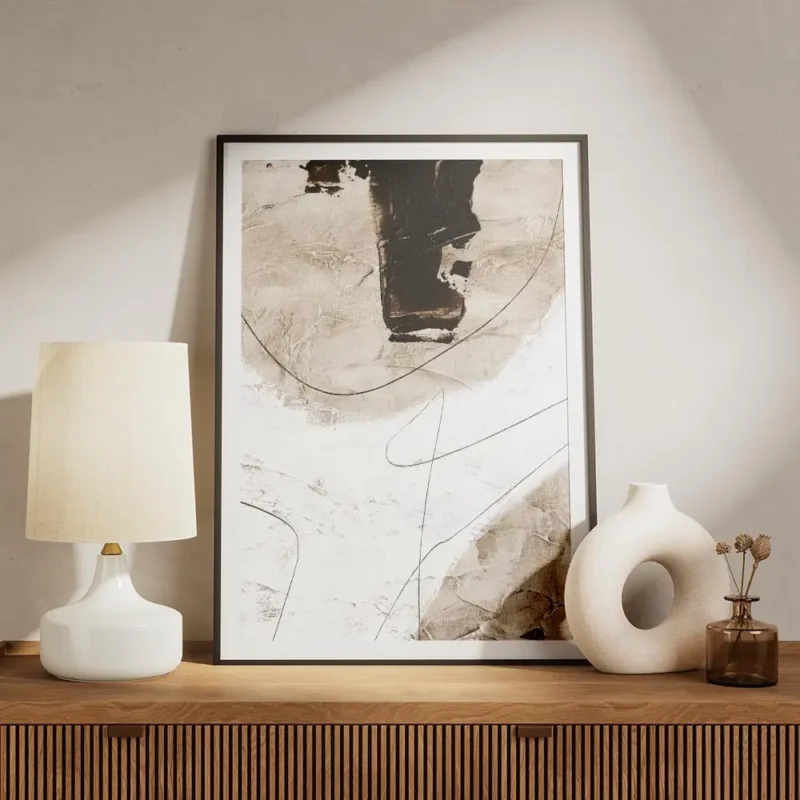 affiche abstraite beige et blanc avec des formes organiques et des lignes noires meuble.webp