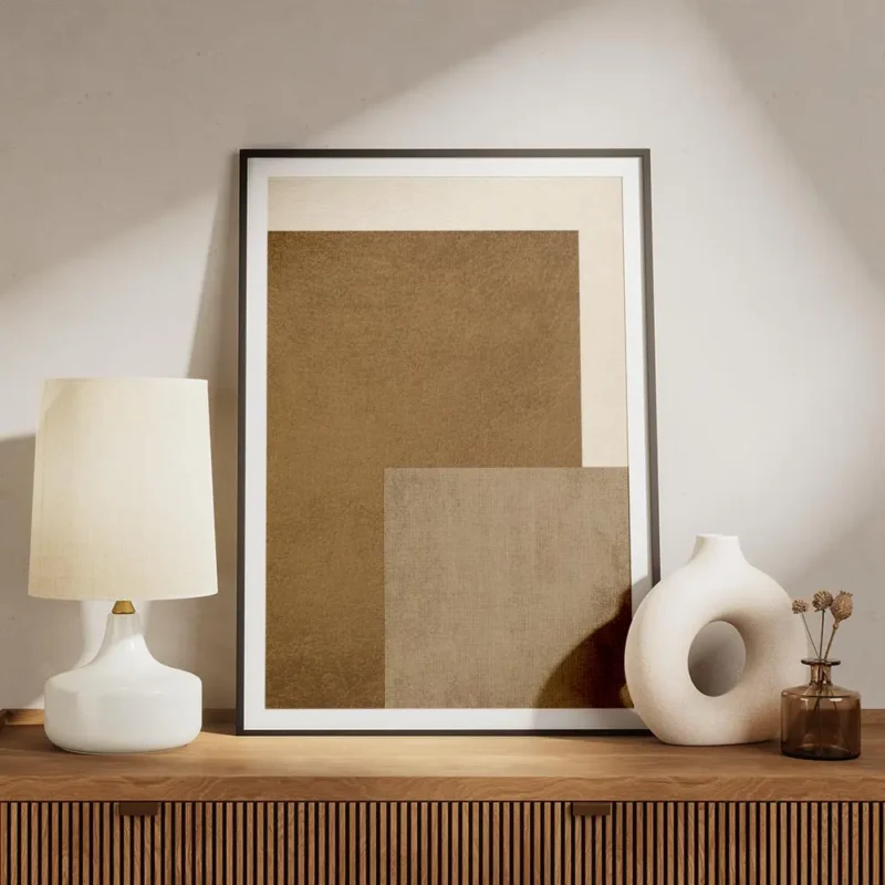 affiche abstraite de textures en cuir marron toile beige et fond couleur creme meuble.webp