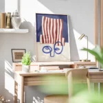 affiche abstraite dun visage bleu minimaliste avec un chapeau a rayures rouges e bureau.webp