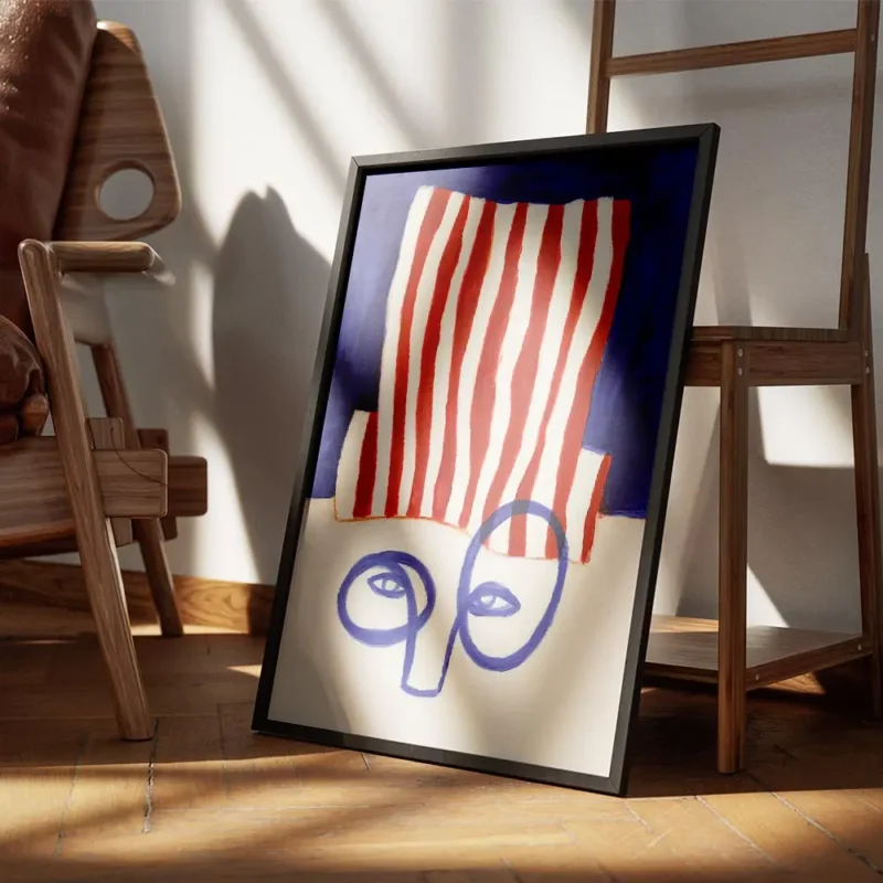 affiche abstraite dun visage bleu minimaliste avec un chapeau a rayures rouges e encadre.webp