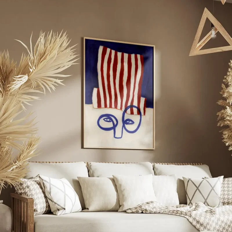 affiche abstraite dun visage bleu minimaliste avec un chapeau a rayures rouges e salon.webp