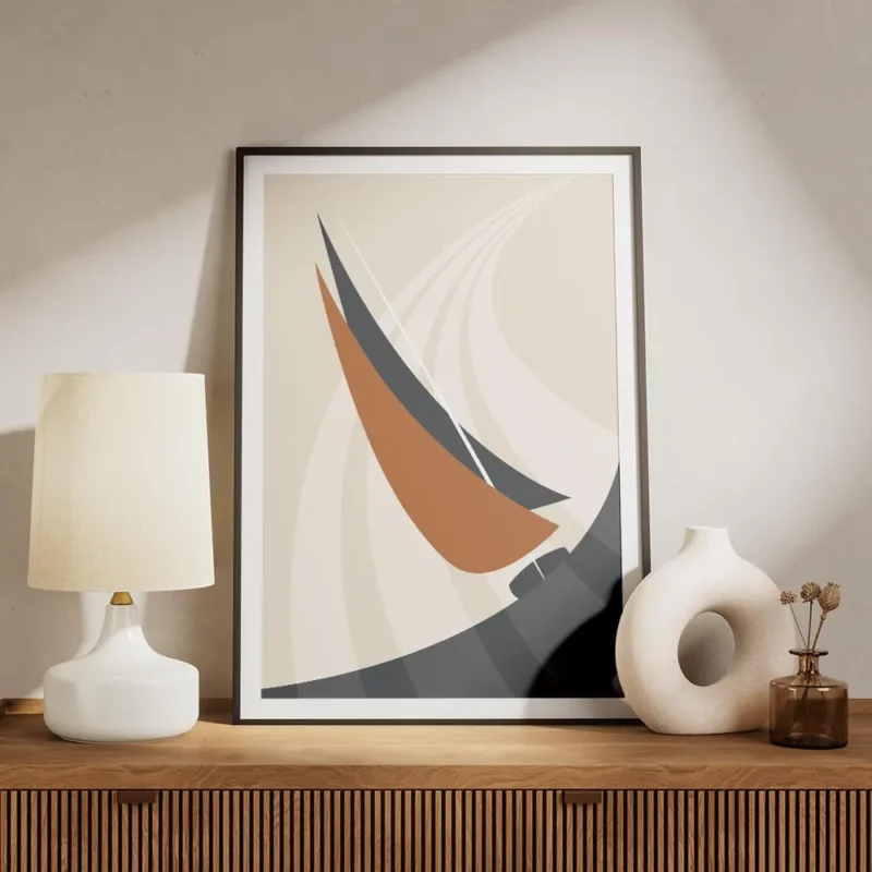 affiche abstraite dun voilier orange et bleu marine sur locean avec des lignes d meuble.webp