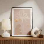 affiche abstraite dune fleur rose aux petales textures et formes organiques sur meuble.webp