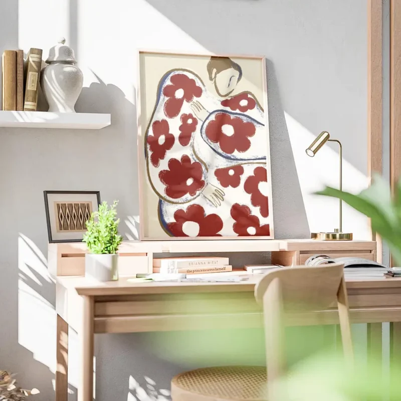 affiche abstraite dune personne aux formes arrondies et aux motifs de fleurs rou bureau.webp