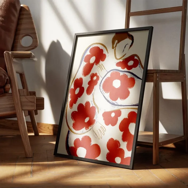 affiche abstraite dune personne aux formes arrondies et aux motifs de fleurs rou encadre.webp