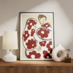 affiche abstraite dune personne aux formes arrondies et aux motifs de fleurs rou meuble.webp
