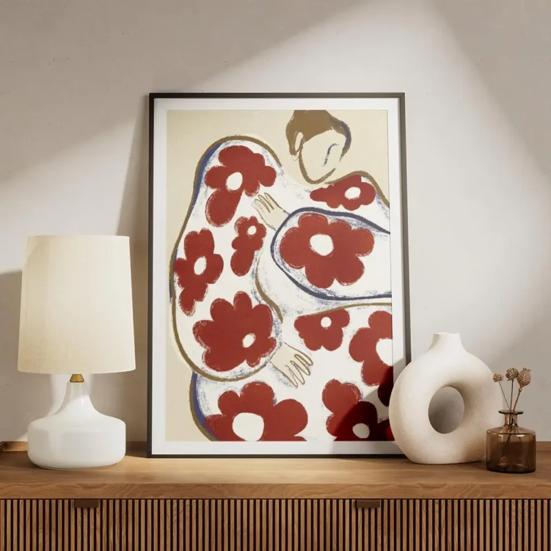 affiche abstraite dune personne aux formes arrondies et aux motifs de fleurs rou meuble.webp