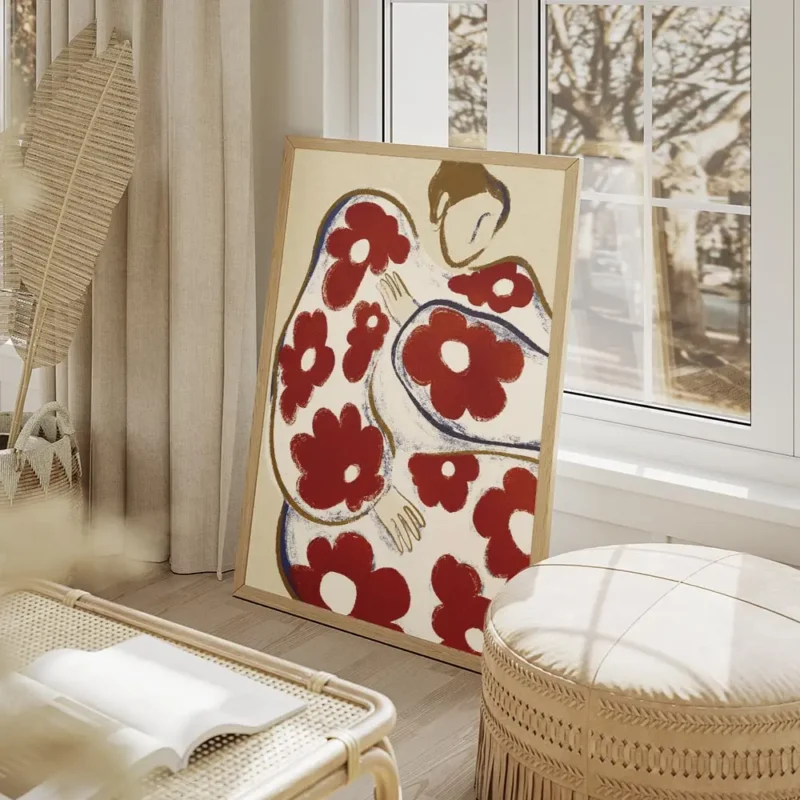 affiche abstraite dune personne aux formes arrondies et aux motifs de fleurs rou salon beige.webp