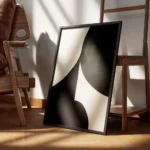 affiche abstraite minimaliste avec des formes graphiques organiques en noir et b encadre.webp
