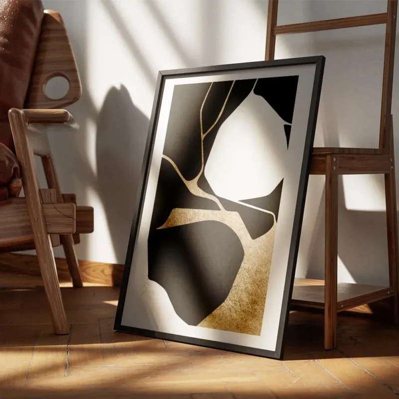 affiche abstraite noire et blanche avec des formes organiques et des details dor encadre.webp