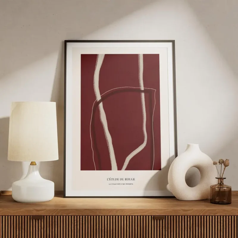 affiche abstraite rouge no1 avec des lignes claires sur fond rouge fonce et text meuble.webp
