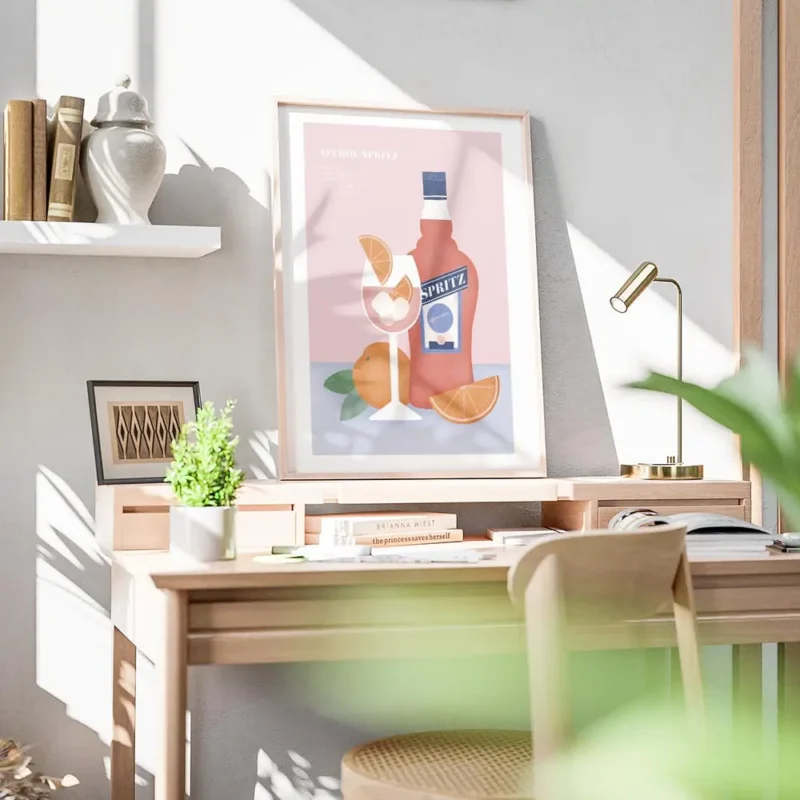 affiche aperol spritz avec bouteille verre et oranges sur fond bleu et rose rece bureau.webp