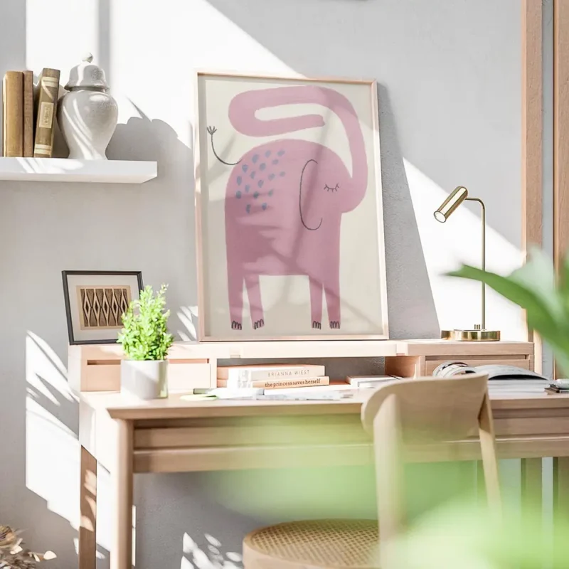 affiche artistique dun elephant rose avec des taches bleues et une trompe courbe bureau.webp