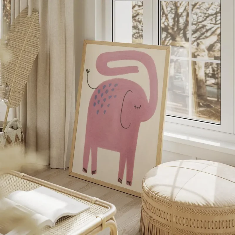 affiche artistique dun elephant rose avec des taches bleues et une trompe courbe salon beige.webp