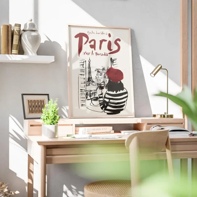 affiche artistique dune femme en beret rouge et mariniere admirant paris depuis bureau.webp