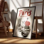 affiche artistique dune femme en beret rouge et mariniere admirant paris depuis encadre.webp