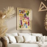 affiche aux formes abstraites et colorees sur fond jaune clair texte vert sur le salon.webp