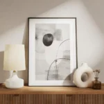 affiche aux formes abstraites monochromes en gris noir et blanc avec effet de co meuble.webp