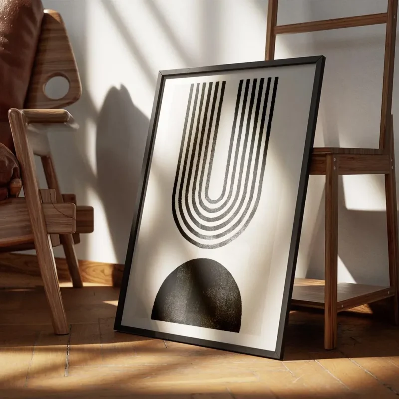 affiche avec arche abstraite en noir composee de lignes et forme noire sur fond encadre.webp