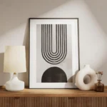 affiche avec arche abstraite en noir composee de lignes et forme noire sur fond meuble.webp