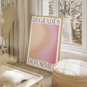 affiche avec degrade de couleurs orange rose et jaune aux textures granuleuses t salon beige.webp