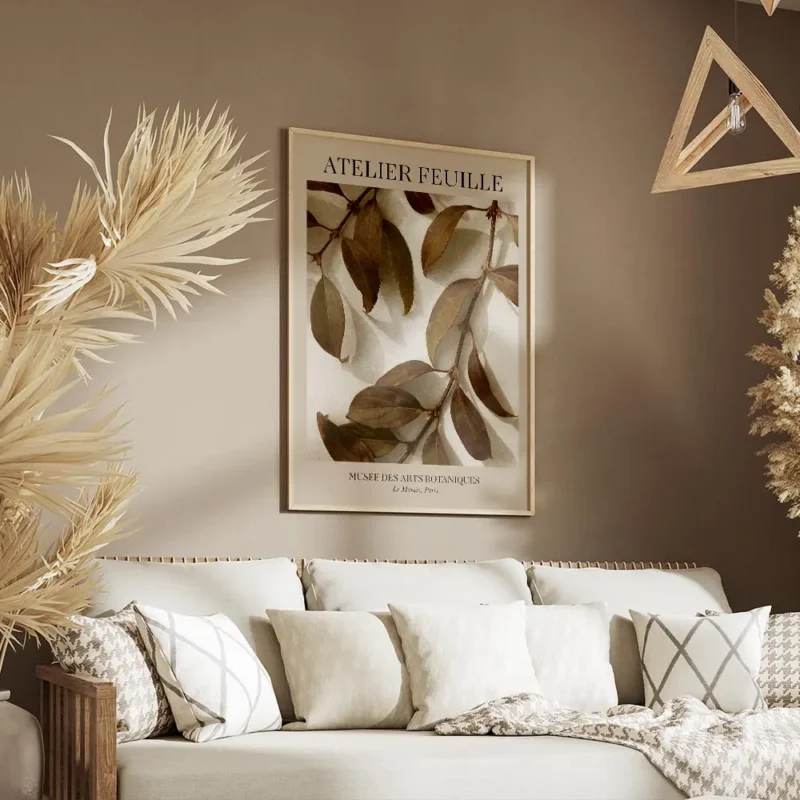 affiche avec des branches aux feuilles marron et vertes sur un fond beige titre salon.webp