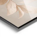 affiche avec des feuilles beiges et roses en cascade sur une branche sur un fond aluminium.webp