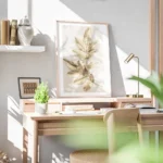 affiche avec des feuilles dorees delicates sur un fond clair decoration murale d bureau.webp